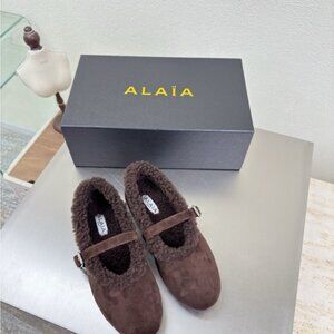 Alaia Chocolate Shearling Loafers